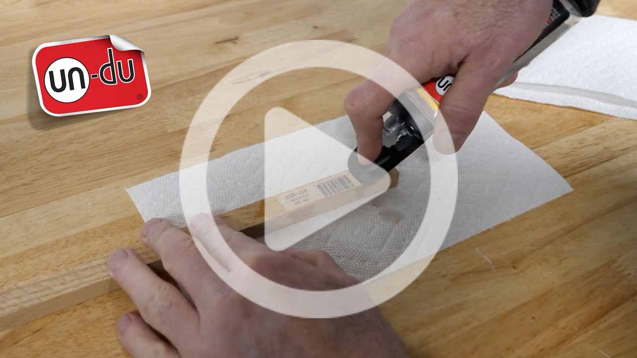 How to remove UPC sticker from unfinished wood using un-du remover